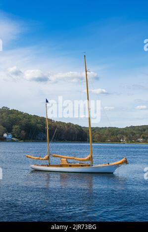 A classic wooden ketch moored in the bend of the Mystic river. Stock Photo