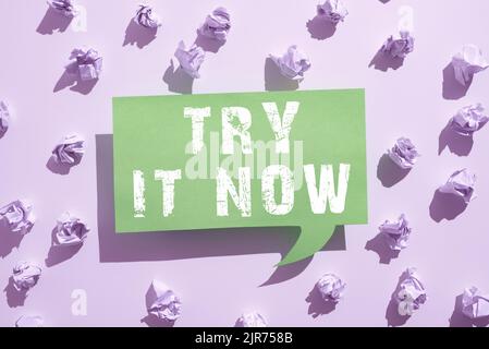 Sign displaying Try It Now, Internet Concept Free trial of something new experiment different things Paper Wraps Placed Around Speech Bubble With Impo Stock Photo