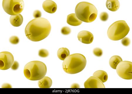 Falling pitted olive isolated on white background, selective focus Stock Photo