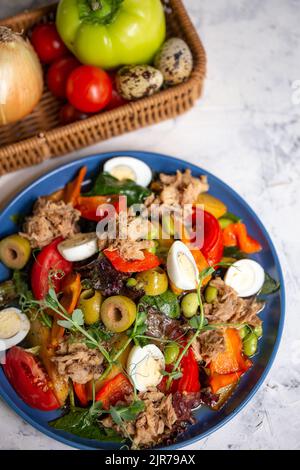 nicoise salad with tuna on the table with vegetables top view Stock Photo