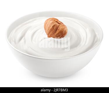 hazelnut, nut with sour cream, yogurt, isolated on white background, clipping path, full depth of field Stock Photo