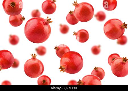 Falling pomegranate isolated on white background, selective focus Stock Photo