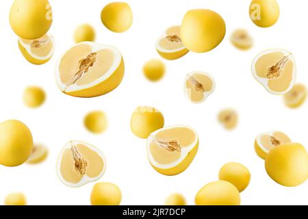 Falling yellow pomelo, isolated on white background, selective focus Stock Photo