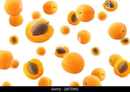 Falling apricot isolated on white background, selective focus Stock Photo