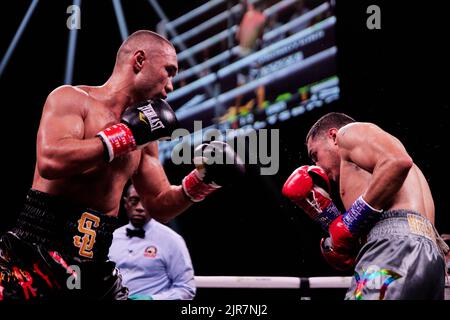 Professional boxer IBF Light-welterweight Sergey Lipinets defeats WBC Lightweight Omar Figueroa Jr. in a 12-round boxing match Stock Photo