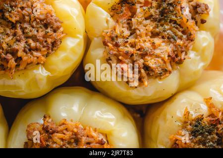 Traditional food classic stuffed bell peepers paprika with minced meat and rice in bowl baked and cooked fresh healthy food full frame macro ready to Stock Photo