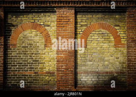 An old brick walls with arches design Stock Photo