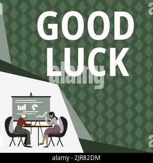 Text sign showing Good Luck. Business idea A positive fortune or a happy outcome that a person can have Colleagues Sitting On Desk With Laptop Papers Stock Photo