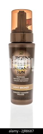 Winneconne, WI - 23 July 2022: A package of Jergens natural glow instant tan on an isolated background. Stock Photo