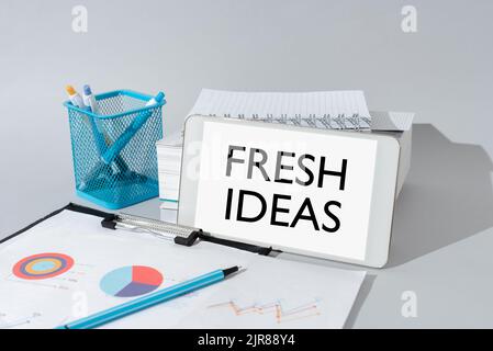 Inspiration showing sign Fresh Ideas, Business concept thought or suggestion as to possible course of action Important Idea Shown On Phone On Desk Wit Stock Photo