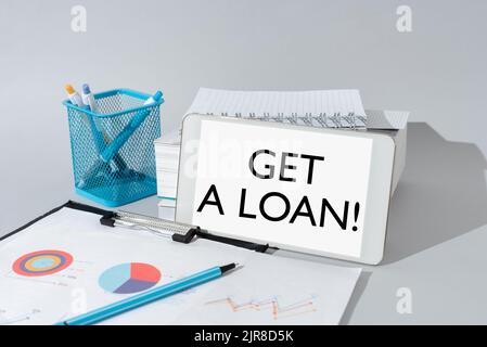 Writing displaying text Get A Loan. Concept meaning mount of money that is borrowed often from bank has paid back Important Idea Shown On Phone On Stock Photo