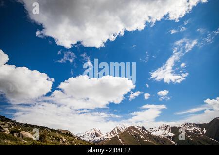 HDR photo of mountain range with big cloudy sky Stock Photo