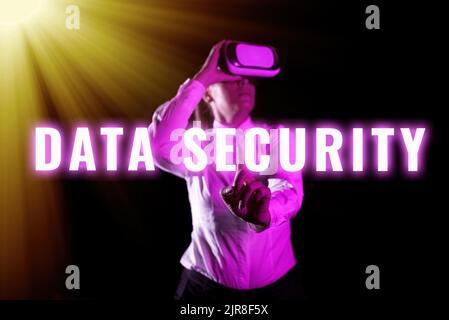 Handwriting text Data Security. Business showcase Confidentiality Disk Encryption Backups Password Shielding Woman Using Virtual Reality Simulator And Stock Photo