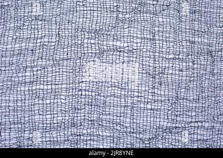 Black textile mesh on white background. Fabric, cobweb, background texture Stock Photo
