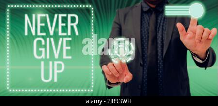 Text caption presenting Never Give Up. Business idea Keep trying until you succeed follow your dreams goals Businessman In Suit Pointing With Two Stock Photo