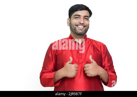Young Male Model Smiling and thumbs up gesture. Stock Photo