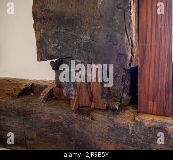 Old and new preservation of a small section of window frame at Adlington Hall in Cheshire Stock Photo