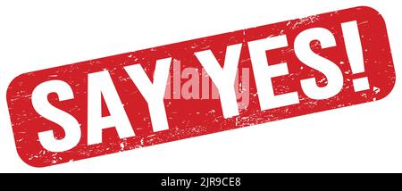SAY YES! text written on red grungy stamp sign. Stock Photo