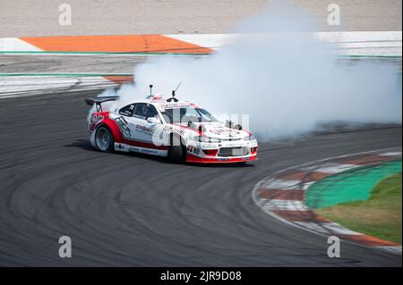 A Nissan Silvia S15 Kouki skidding on a race track Stock Photo