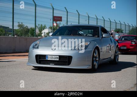 A Japanese silver Nissan 350Z on an asphalt road Stock Photo