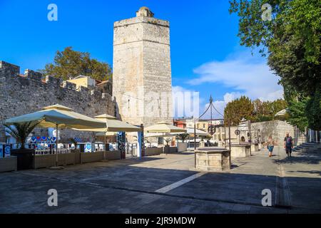 ZADAR, CROATIA - SEPTEMBER 14, 2016: The Tower of Captain with ramparts are part preserved fortifications of the old city of Zadar. Stock Photo