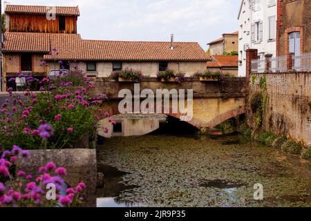 View of the little bridge in the town of Aire sur l'Adour in the New Aquitaine. France Stock Photo