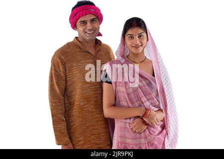 Portrait of happy Bihar couple against white background Stock Photo - Alamy