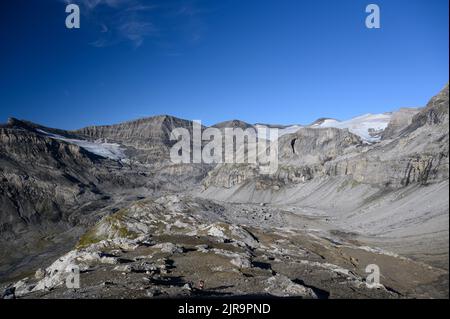 alpine hikinger at Lämmerengrat with Wildstrubelglacier Stock Photo
