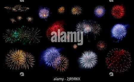Multicolored fireworks set isolated on black background. Colorful bright firework flashes variety for celebration and holyday concept. Design element. Stock Photo