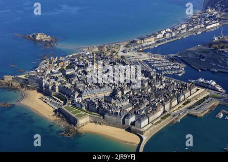 Aerial view of Port Vauban marina at night with illuminated yachts ...