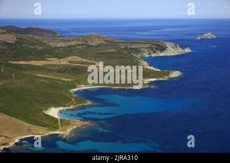 Northern Corsica, Haute-Corse department: aerial view of the coast of the Cap Corse peninsula and the anchorage of the natural harbour of Santa-Maria Stock Photo