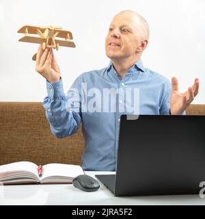 Summer business dreams. Millennial business man in suit floating with  cocktail and laptop in swimming pool. Summer vacation. Funny crazy  businessman Stock Photo - Alamy