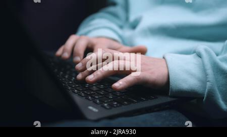 Programmers Hands Are Coding On A Laptop In The Dark With A View