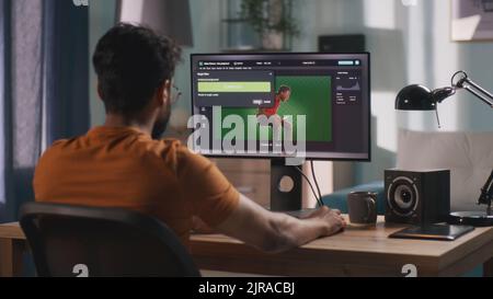 Anonymous male using computer to integrate 3D graphic into footage with real man during work in home office Stock Photo