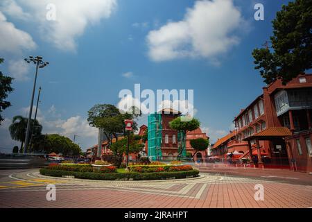 Malacca, Malaysia - August 10, 2022: Long Exposure capture of the red square or Dutch square in the city of Melaka. Passing cars as visible as a veil. Stock Photo