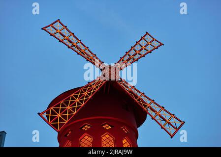 PARIS, FRANCE -APRIL 7, 2018: Moulin Rouge is the famous cabaret in the city Stock Photo