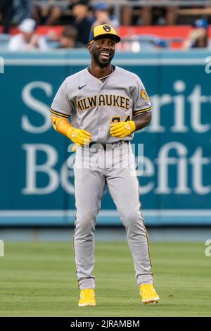 Milwaukee Brewers designated hitter Andrew McCutchen reacts as he