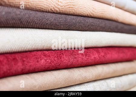 Rolls of colorful velours fabric. textile background Stock Photo