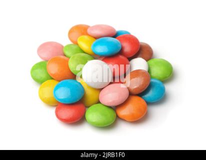 Pile of colorful glazed candy dragees isolated on white Stock Photo