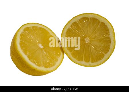 Whole lemon sliced in half isolated on white background Stock Photo