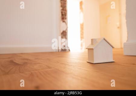 Model house on hardwood floor in apartment Stock Photo