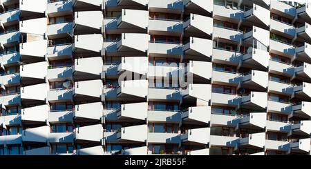 Germany, North Rhine-Westphalia, Cologne, Panoramic view of rows of apartment balconies Stock Photo