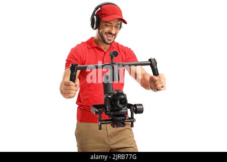 Camera operator recording with a camera and a stabilizer isolated on white background Stock Photo