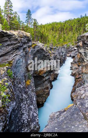 Norway, Innlandet, Long exposure of river Sjoa flowing through Ridderspranget ravine in Jotunheimen National Park