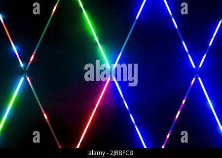Multi colored neon lighting in empty room Stock Photo