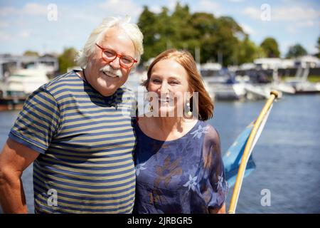 Happy senior couple enjoying sunny day Stock Photo