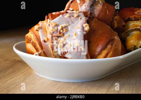 St. Martin's croissant. Traditional polish pastry with poppy-seed filling, nuts. Saint Martin croissant, Rogal świętomarciński, marciński from Poland. Stock Photo