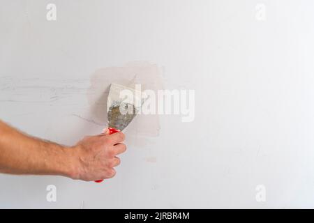 Shot of plastering work on wall with selective focus. Stock Photo