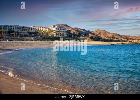 Cabo San Lucas, Mexico - February 10, 2011:  Guests enjoying a luxury resort hotel and spa located on the sea of Cortez and Cabo beach in Mexico. Stock Photo