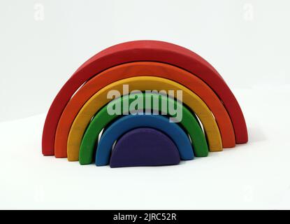 Rainbow coloured arches. A educational toy or puzzle for babies and toddlers Stock Photo